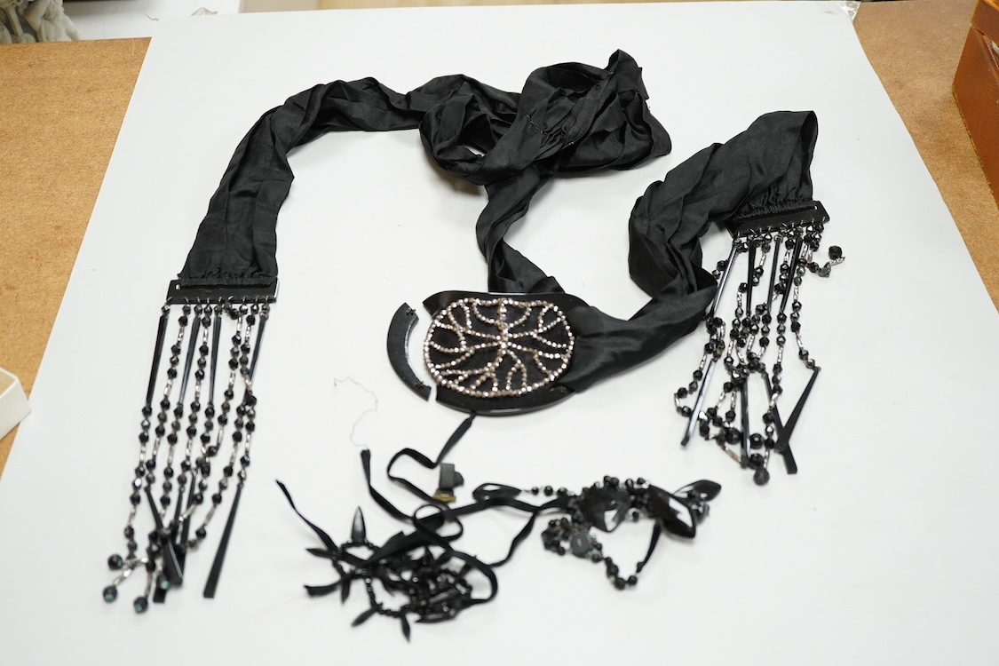 A quantity of assorted antique and later costume jewellery to include a silver and Marcasite ladies fob watch, a collection of cufflinks, brooches and a pair of drop earrings with screw backs